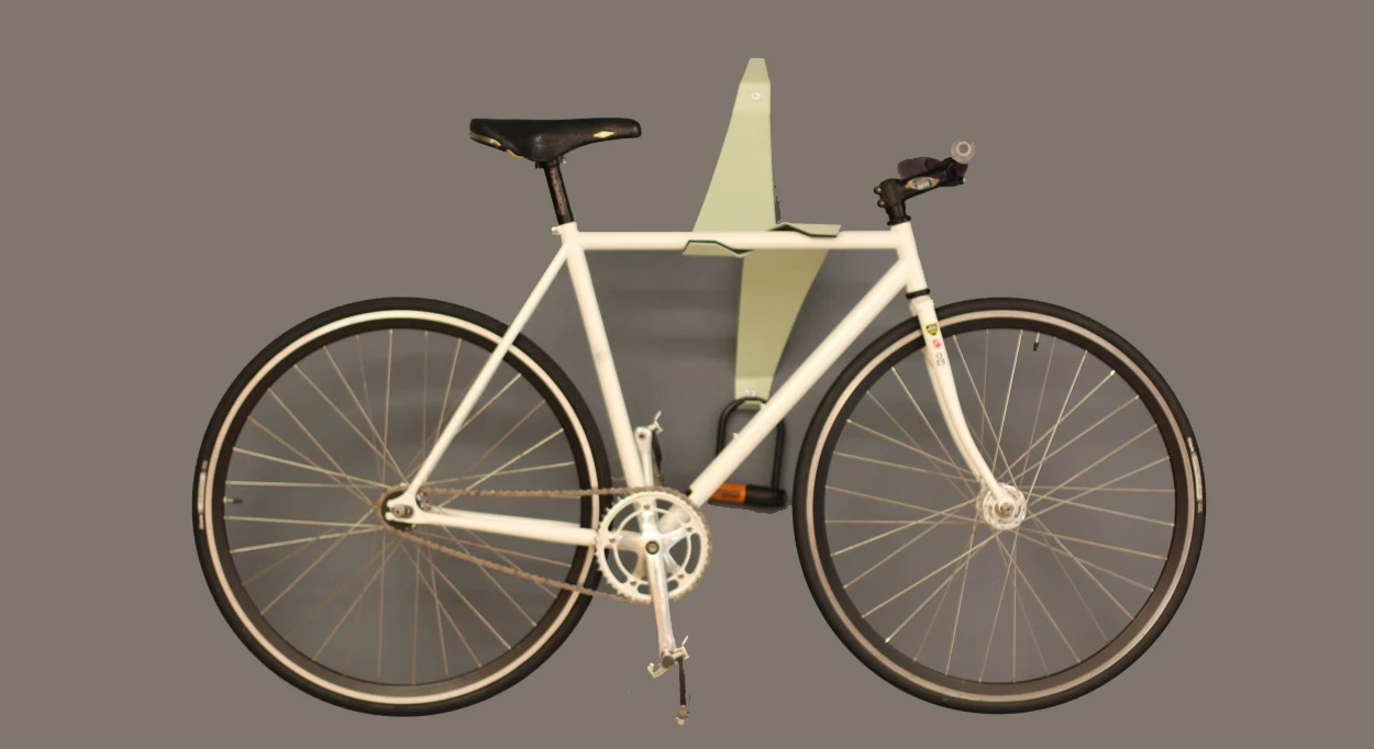 The Bike Valet is a bicycle wall storage device that uses a cantilevered design to hold bikes in place