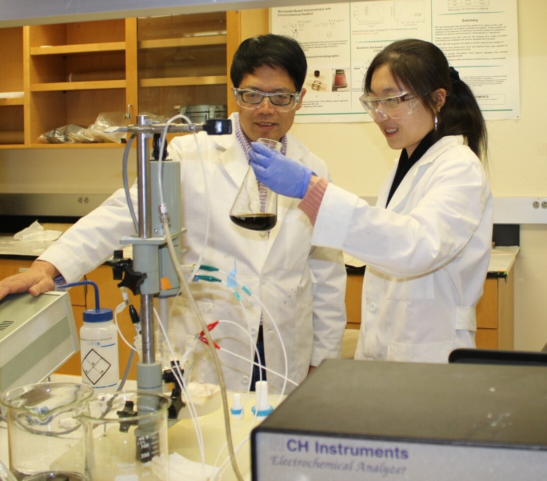 Yuehe Lin (left) and Shaofang Fu, two WSU researchers working on the nanofoam project