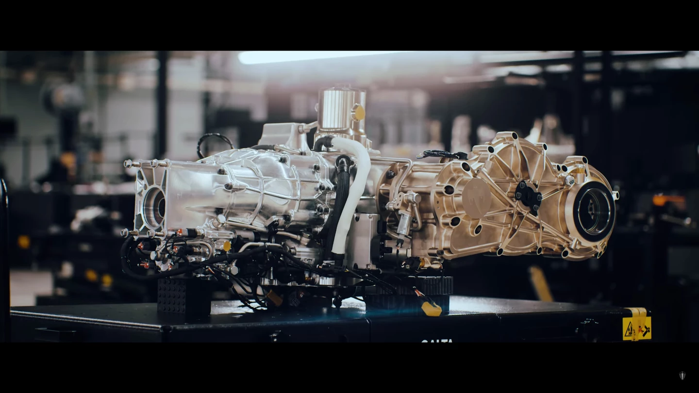 The front of Koenigsegg's Light Speed Tourbillon Transmission (LSTT), left, has an output shaft for front wheel power – to the right, you can see the output flange for the rear-left wheel