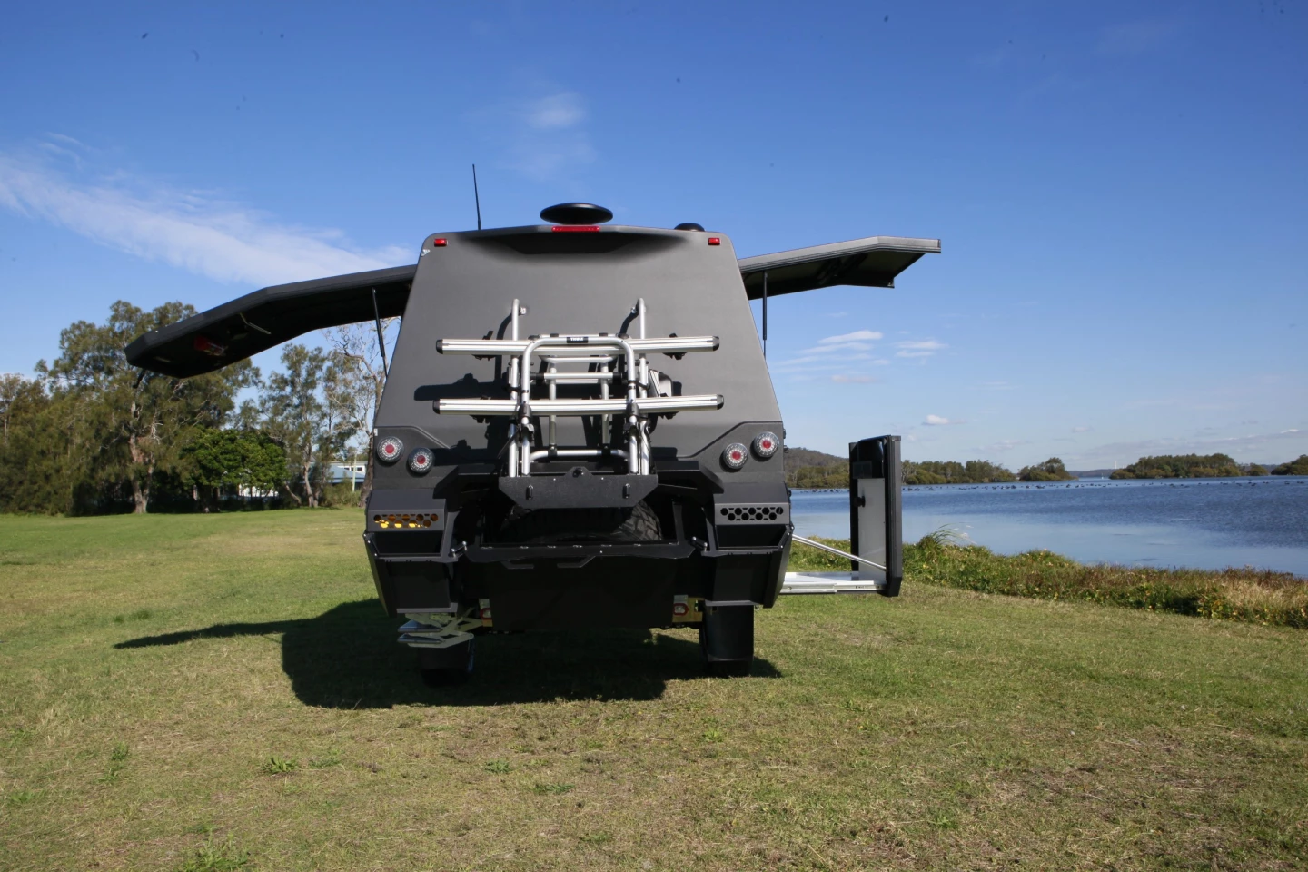 The hatch door on looker's left and expandable hatch bathroom roof and floor on the right