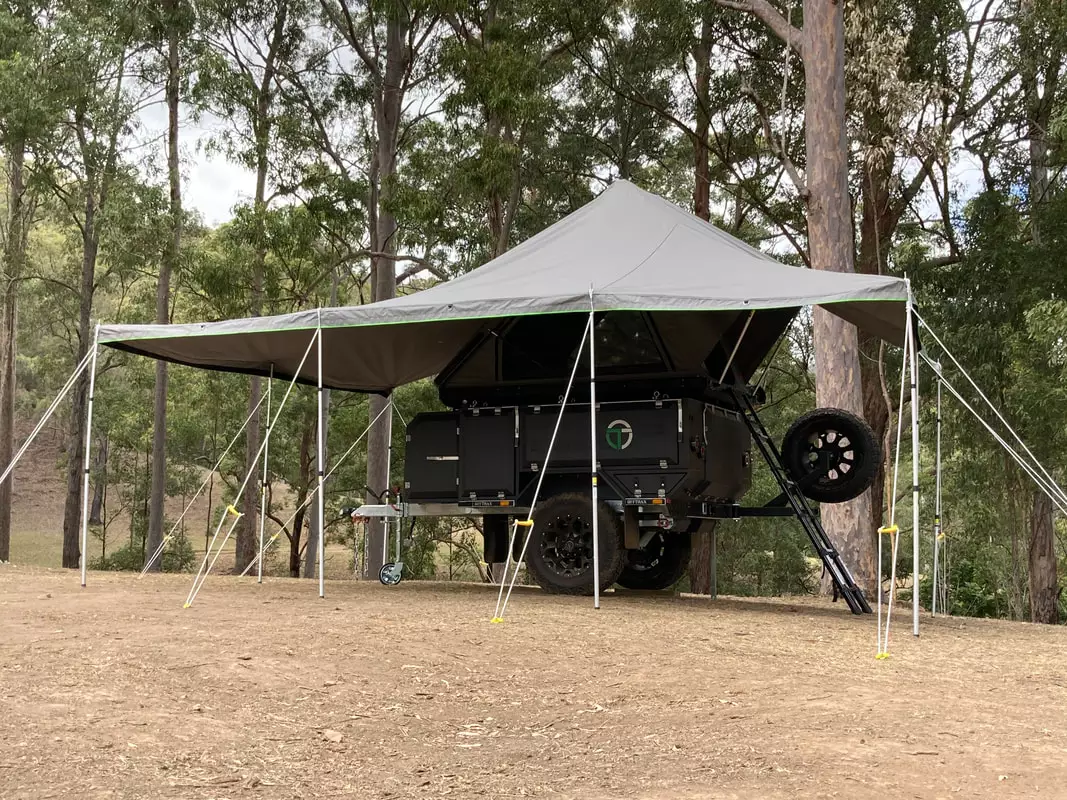 The awning provides plenty of coverage over the kitchen, front and rear of the trailer