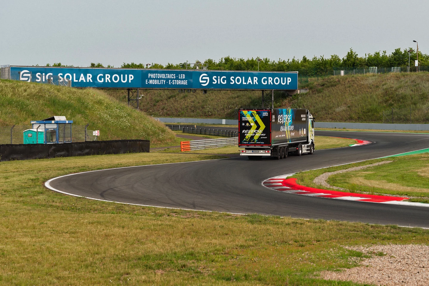 The Mercedes-Benz eActros 600 electric truck hit at least a few apexes at the Motorsport Arena Oschersleben racetrack in Germany while it snaked its way around the track in reverse