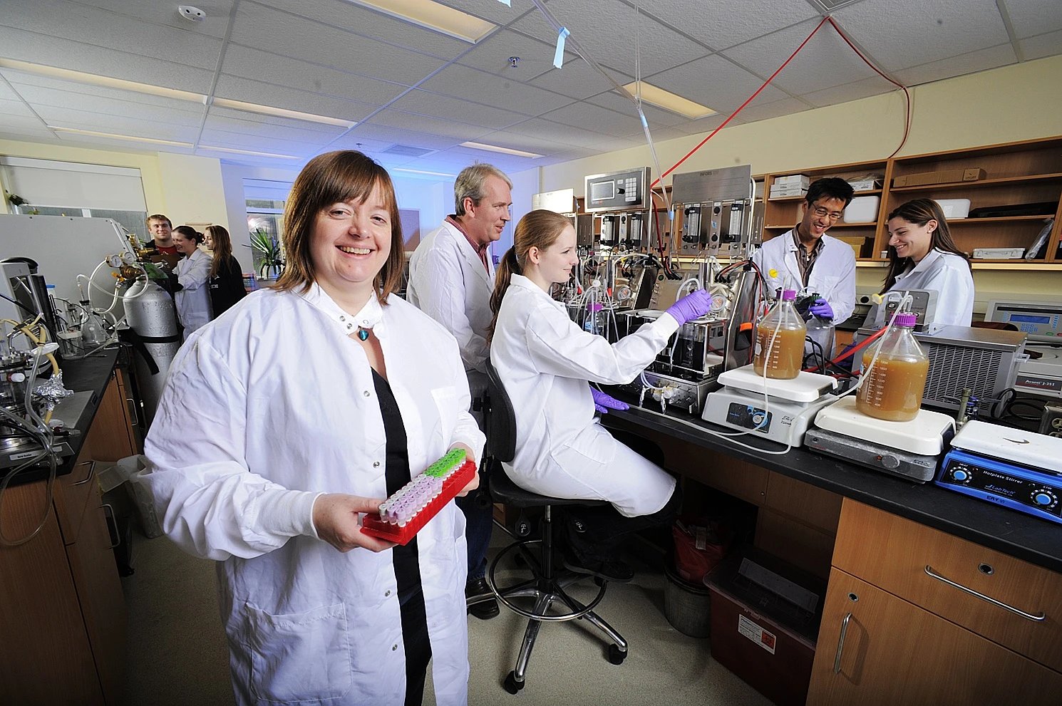 Microbiologist Emma Allen-Vercoe and her lab team, whipping up a batch of RePOOPulate