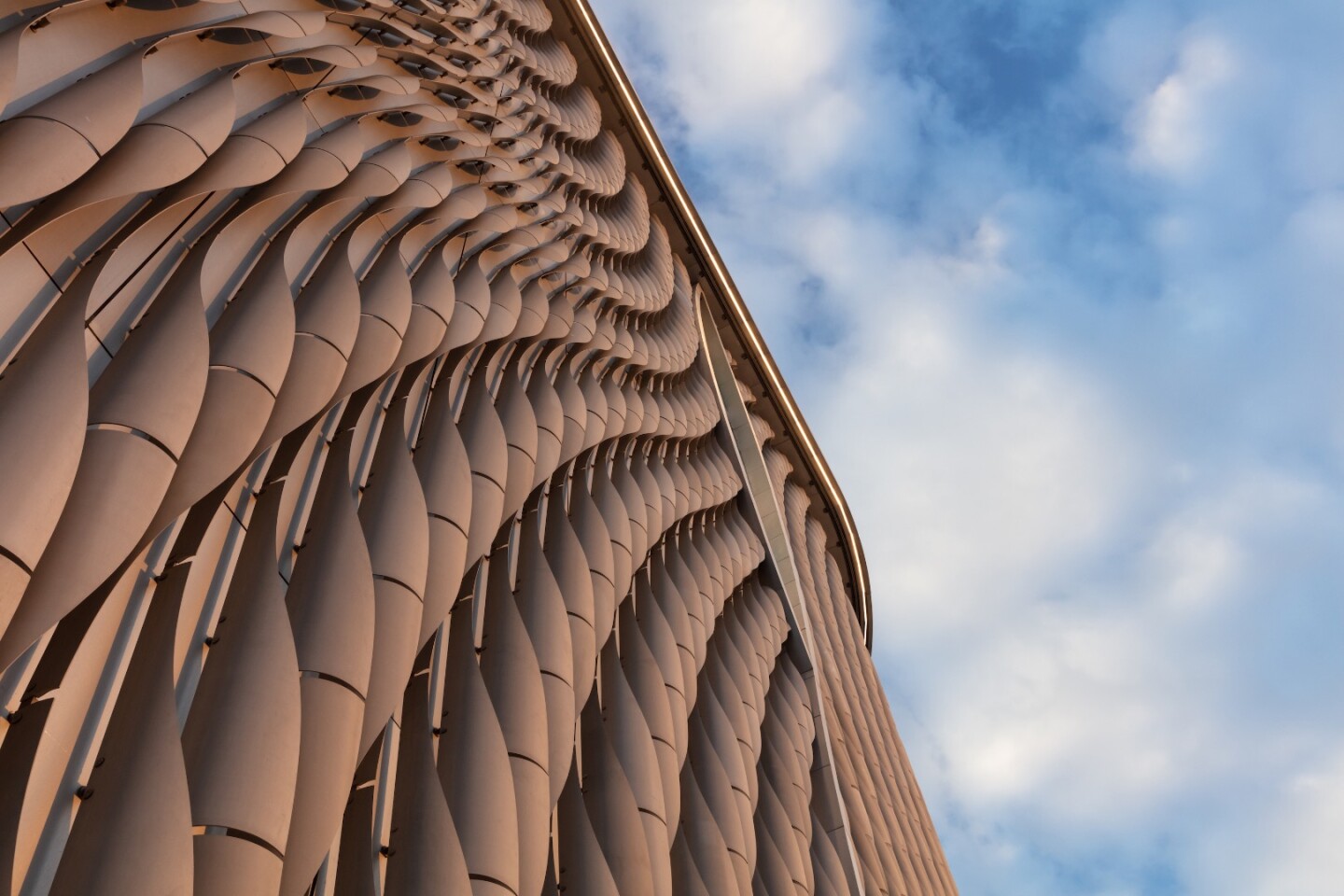 Closeup shot of the Xiqu Centre's aluminum facade