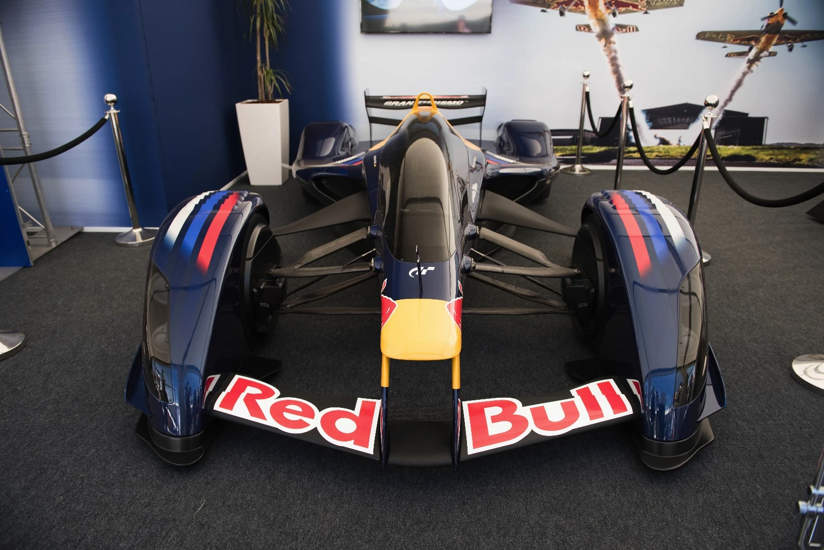 Now it's unlikely you've ever seen one of these before, unless you're a devotee of the PlayStation 3 video game Gran Turismo 5 or Gran Turismo 6 or you've been to the Red Bull Museum. The Red Bull X2010 (originally named Red Bull X1) is a prototype vehicle designed by the world's most successful Formula One race car designer, Adrian Newey in response to a request by Gran Turismo chief Kazunori Yamauchi's for Newy to build "the fastest racing car on land, one that throws aside all rules and regulations". The prototype was designed by Newey (then Red Bull Racing's Chief Technical Officer) in conjunction with Yamauchi. It features enclosed wheels, and a "fan element" to increase low and medium-speed downforce (much like a Chaparral 2J or Brabham BT46B)The prototype was designed by Newey (then Red Bull Racing's Chief Technical Officer Adrian Newey in conjunction with Yamauchi. It features enclosed wheels, and a "fan element" to increase low and medium-speed downforce (much like a Chaparral 2J or Brabham BT46B).