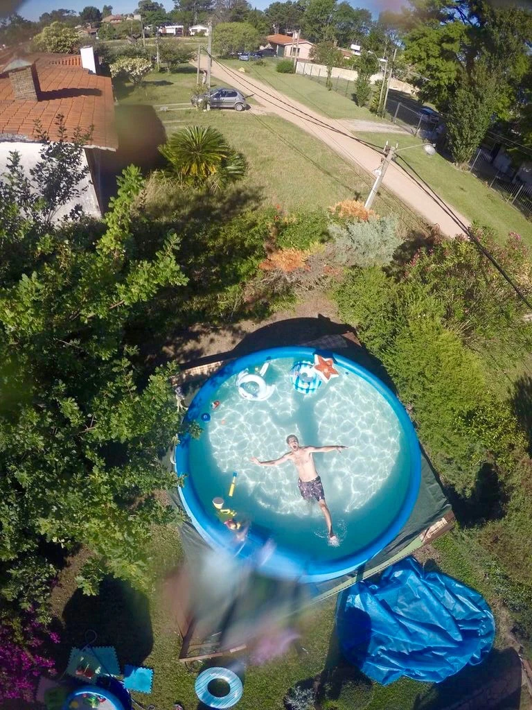 Birdie has a layer of foam at the bottom that acts as a buoyant cushion, allowing it to float GoPro cameras (waterproof case strongly recommended) in water