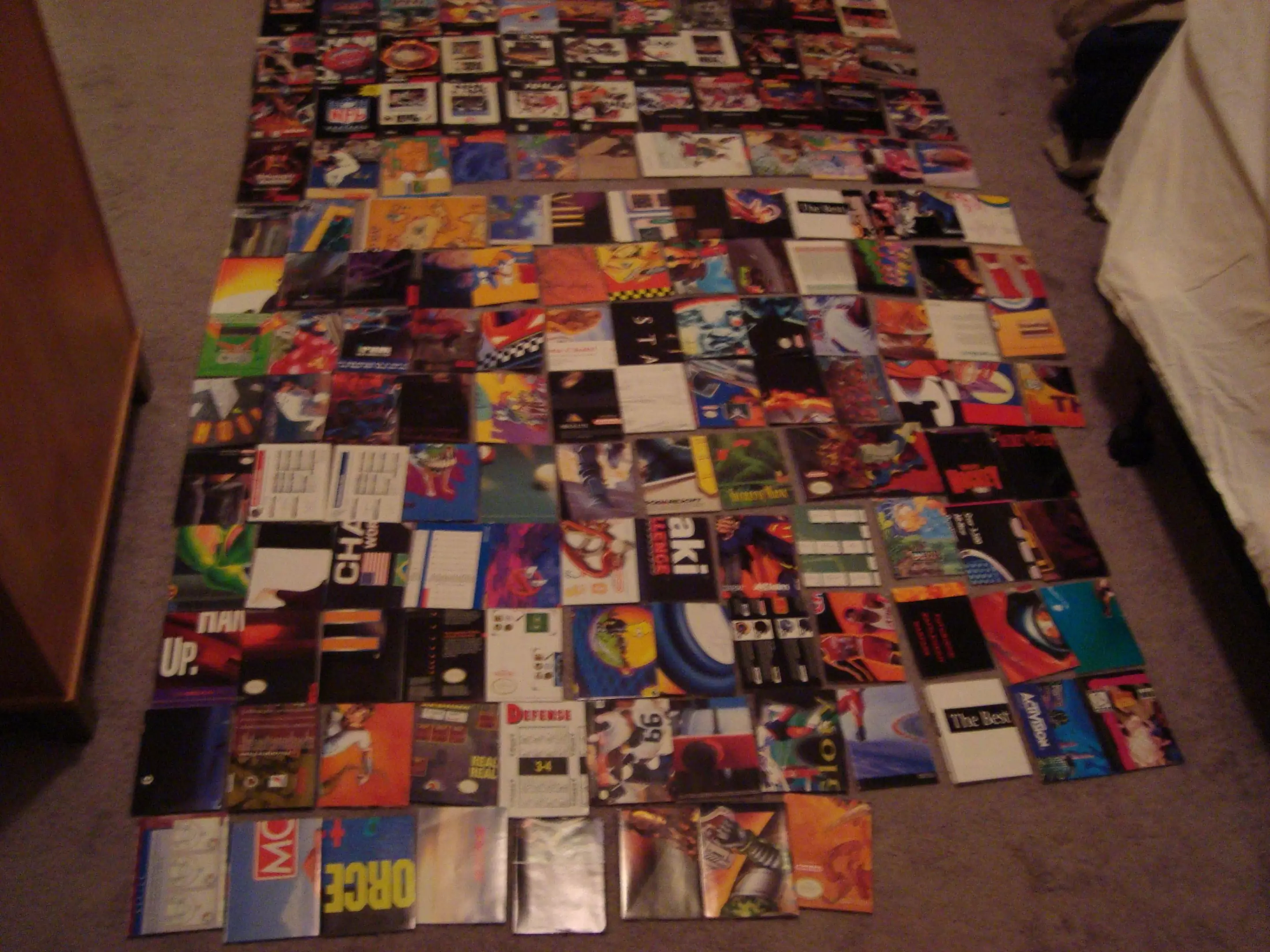 A huge pile of SNES boxes spread across the floor
