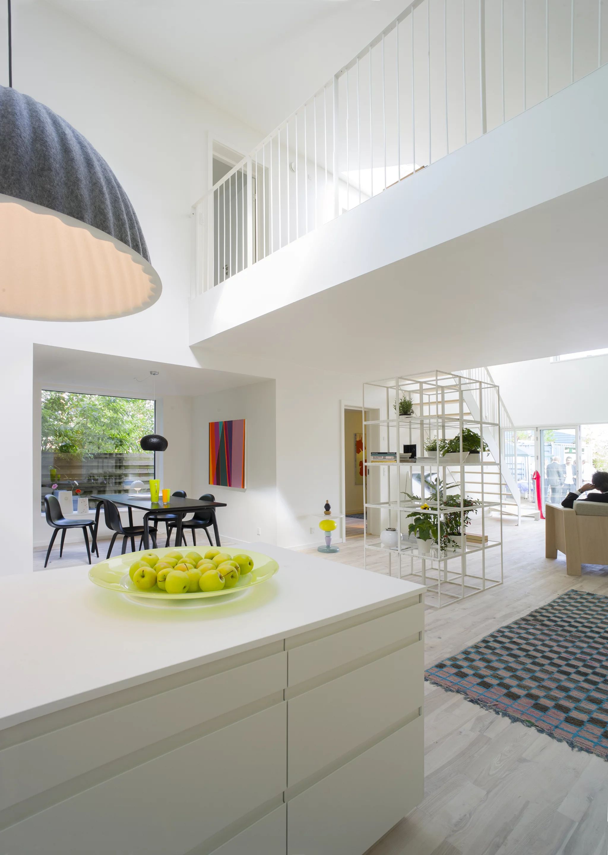 WFH House features a living space, kitchen and four rooms that can be used as bedrooms, a workspace or as a recreation retreat