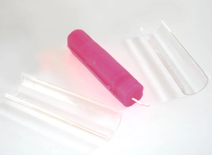 The used wax from several candles forms a whole new candle, which can then be melted to start the process over again