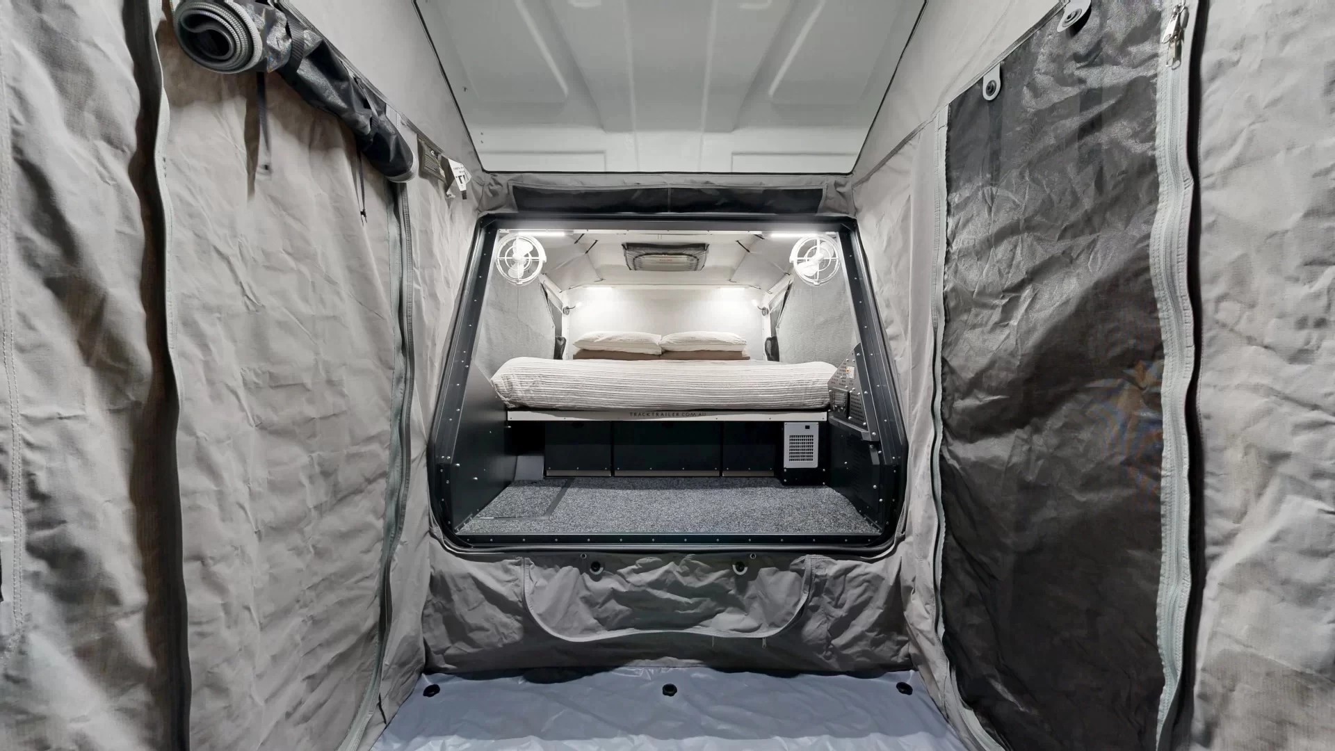 Stepping back on the rear deck inside the tent