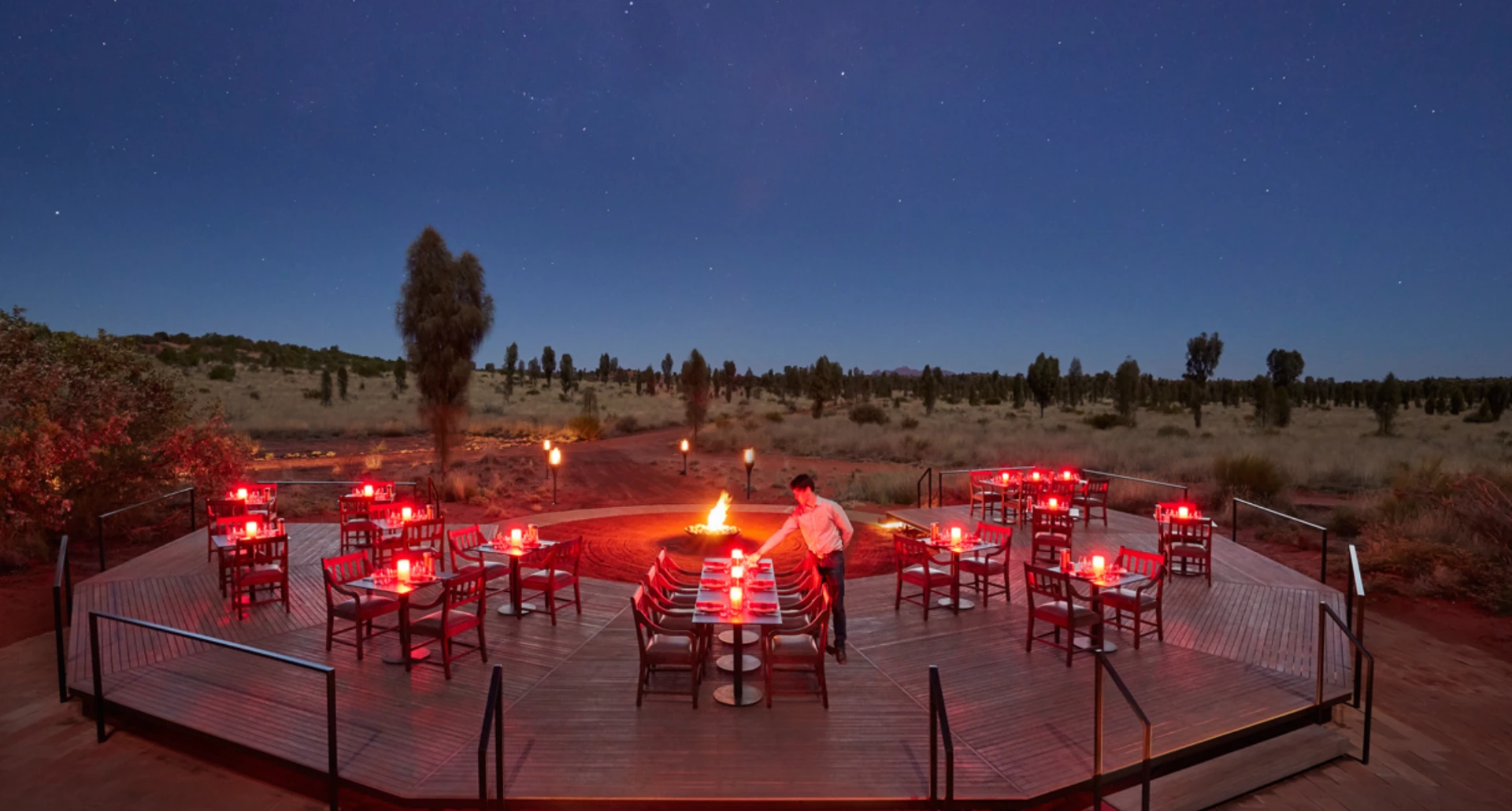 In the center of Australia you’ll find the gigantic and iconic Uluru, and facing it is a luxury hotel called Longitude 131. For those inclined you can helicopter from the local airport to the hotel