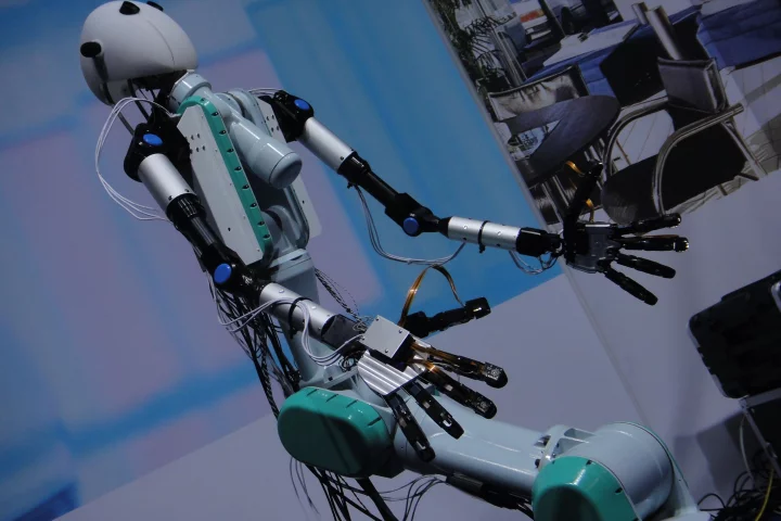 TELESAR V Telexistence Robot Avatar is a remotely controlled robot that transmits sight, hearing and touch sensations to its operator