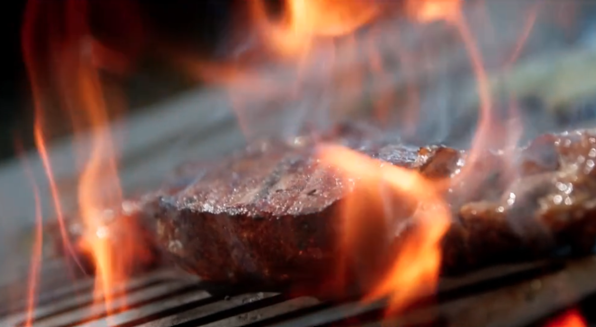 Modular folding camp grill builds like Legos to feed a crowd