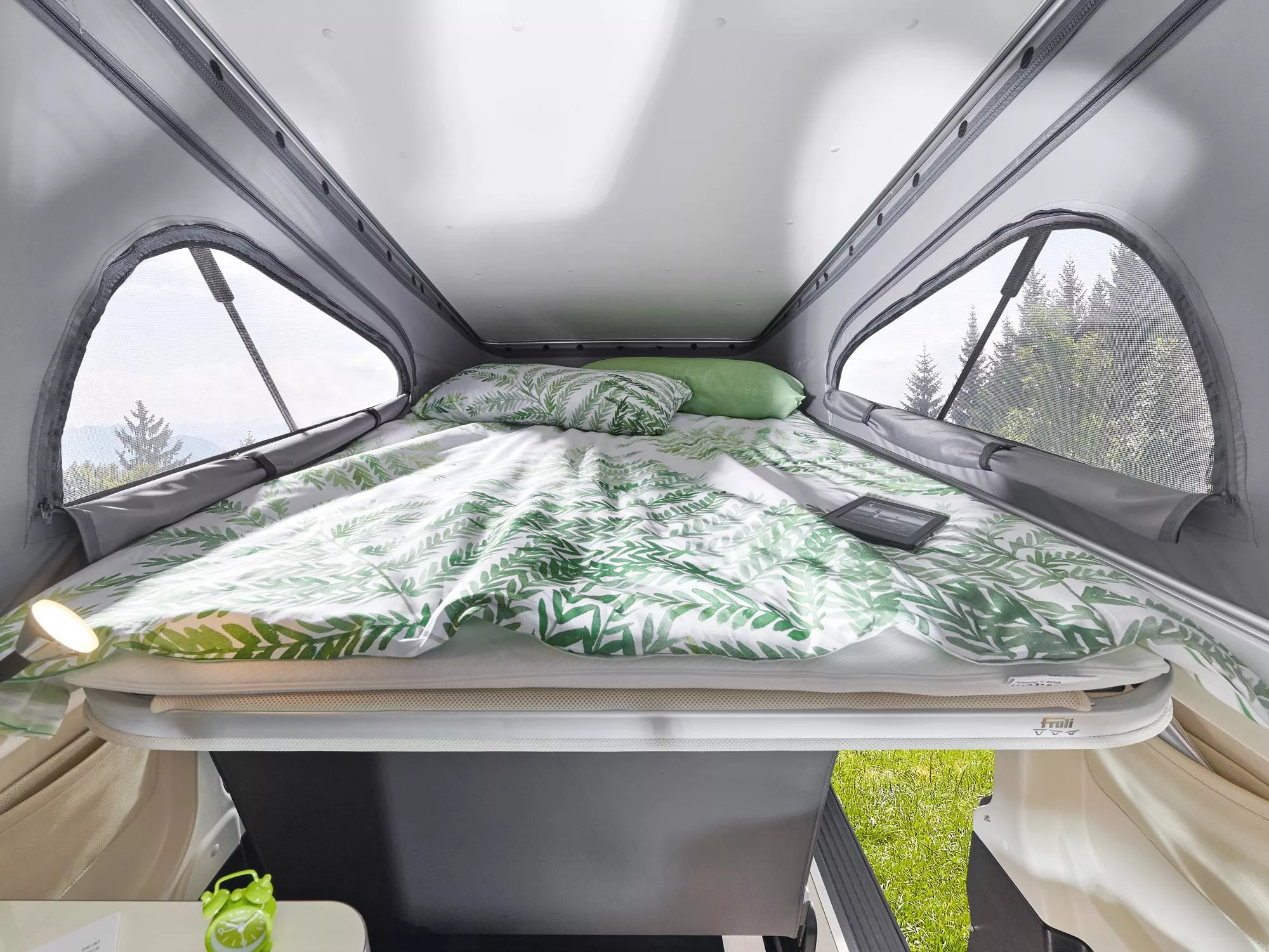 The drop-down bed in the pop-up roof