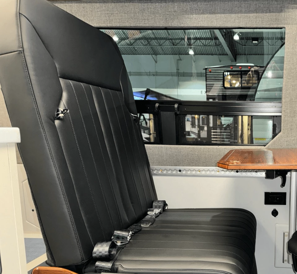 Remote Vans' proprietary Vanhalla seat swivels 90 degrees and folds down into a single bed