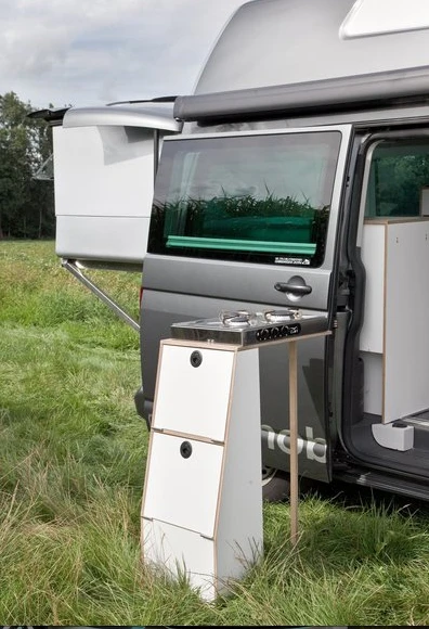The available outdoor kitchen frees up space inside
