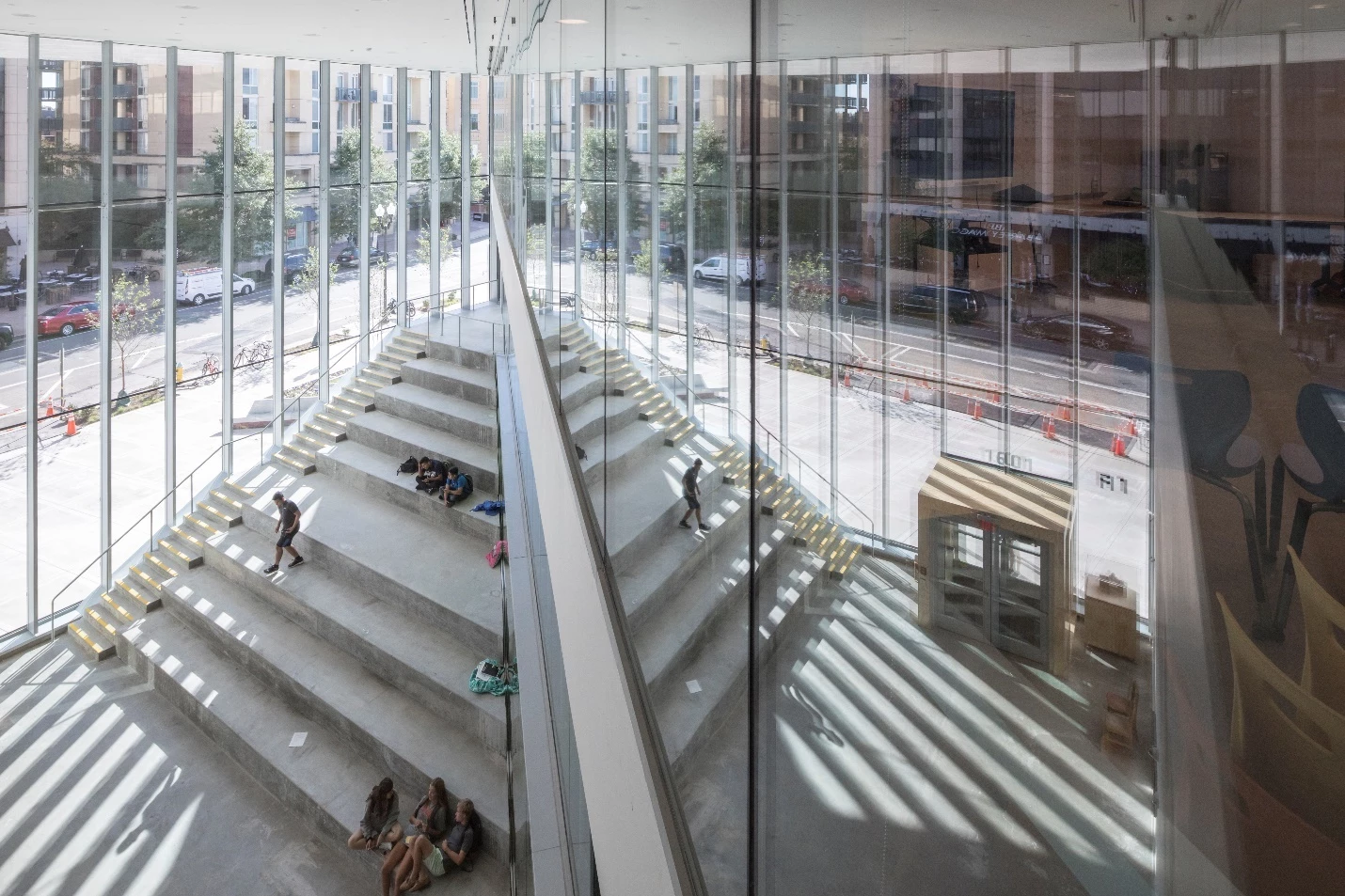 "Underneath the canopy of fanning classrooms, a giant cave holds spaces for all the communal spaces – the theatre, the sports hall, library and canteen – creating a multitude of spaces where students can linger for fun or for study – on their own or in groups," says Bjarke Ingels