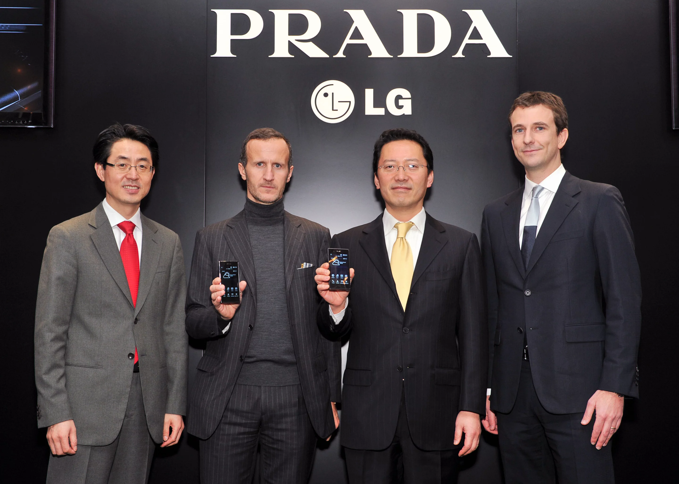 Prada and LG 3.0 executives model the stylish new phone