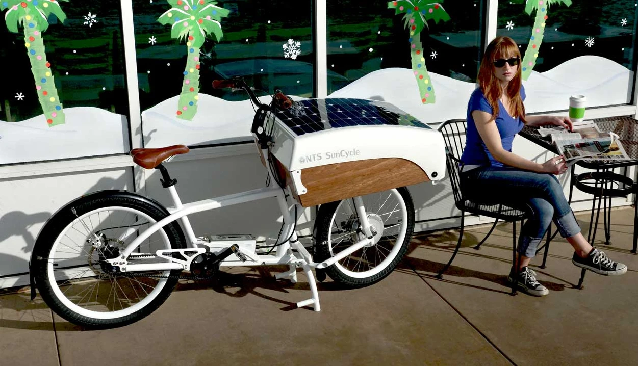 The NTS SunCycle charges its battery using a built-in solar panel