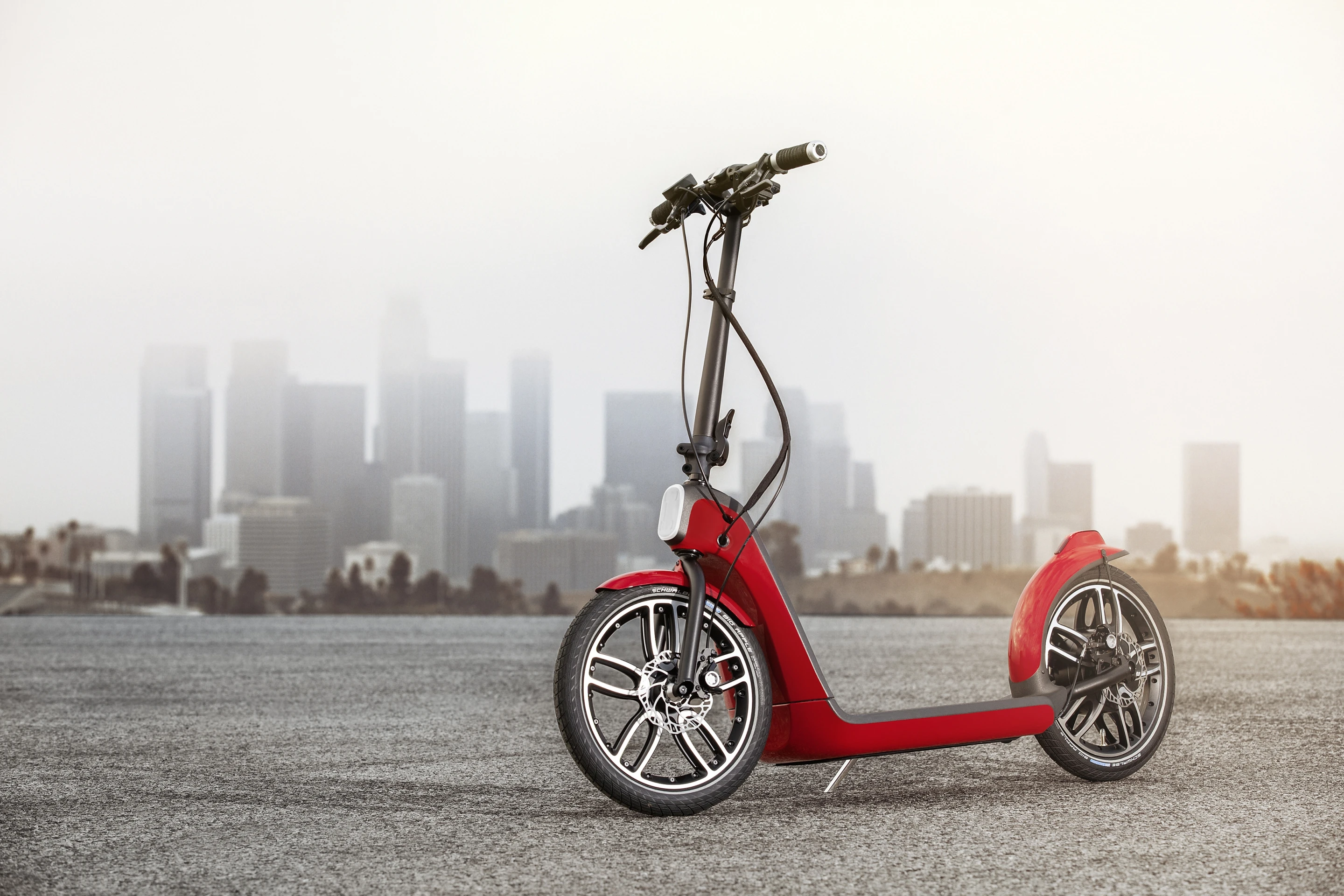 Acceleration is thumb-operated and driven by a gearless hub motor in the rear wheel that is claimed to allow a top speed of 25 km/h (15 mph)