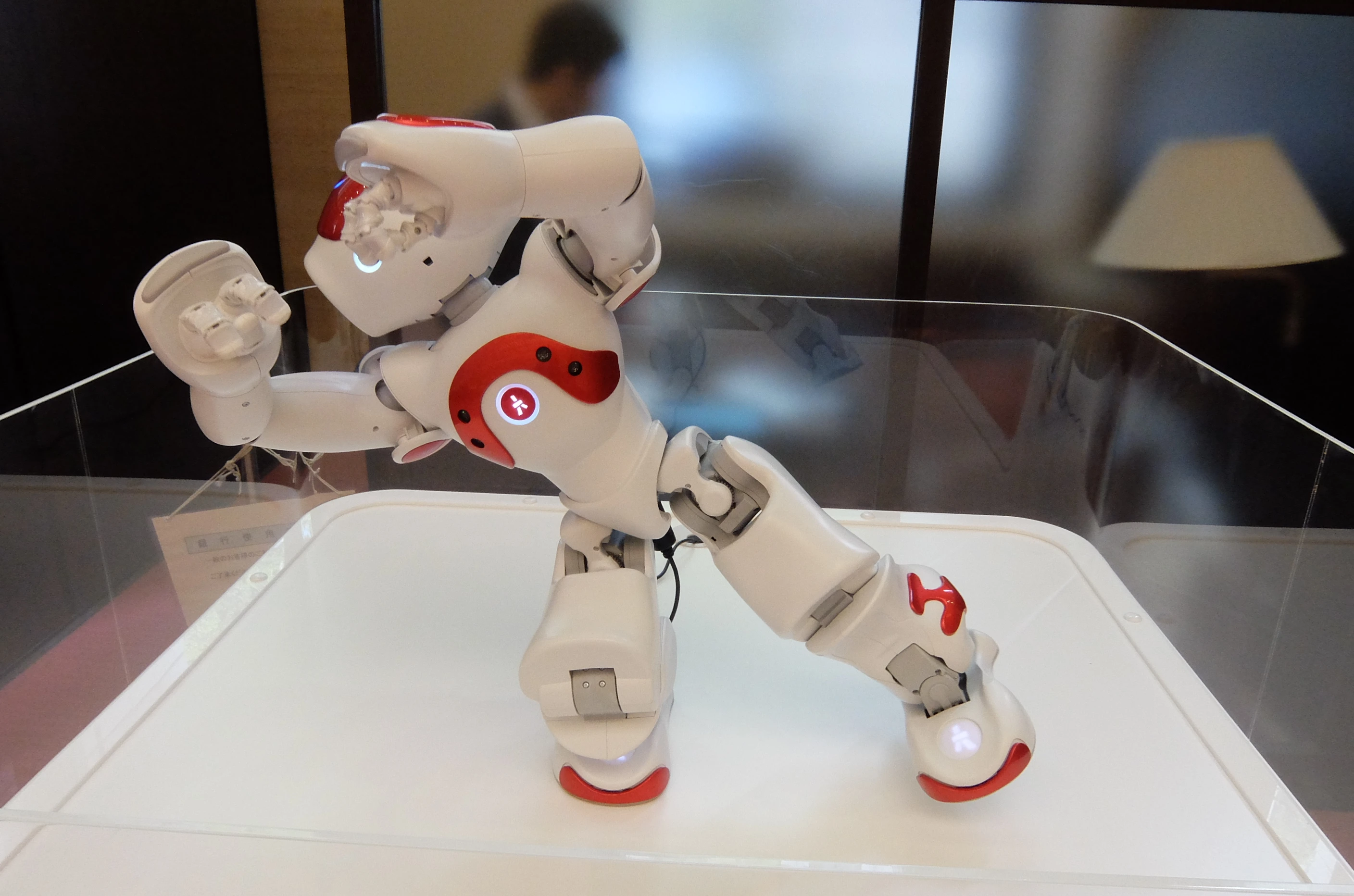 Standing just 58 cm (23 in) high, NAO was given a plinth to put him on eye level with the costumers he greeted (Photo: Stephen Clemenger/Gizmag.com)