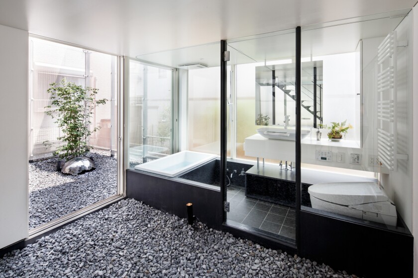 There are hopefully some blinds to lend users of this bathroom a little more privacy (Photo: Jérémie Souteyrat)