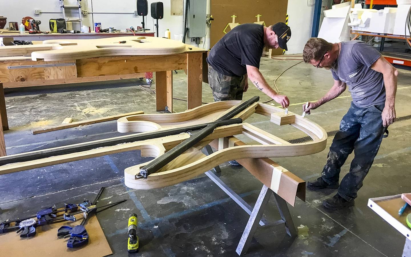 The guitar was made from MDF and steel, with CNC-machines layers making up the body and neck parts laminated together, and cavities created for the electronics and wiring
