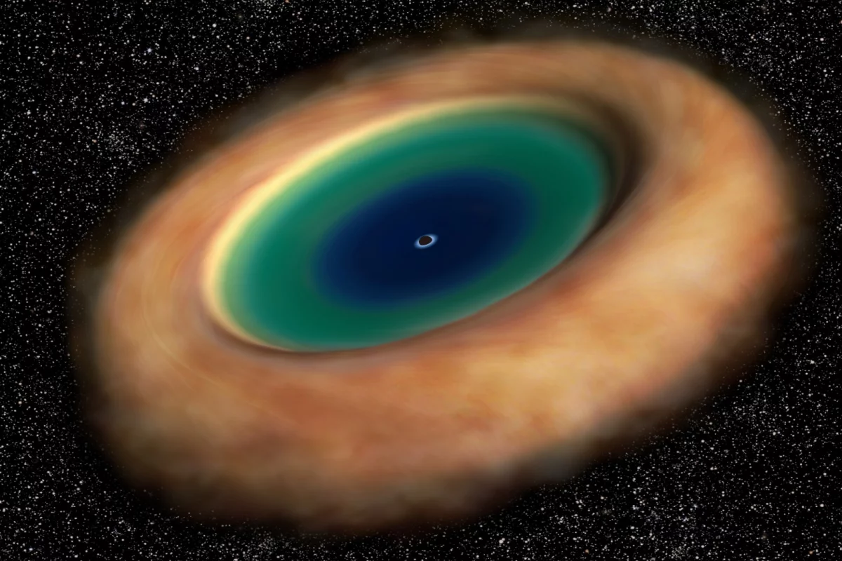 An artist's rendition of the gigantic donut of gas that surrounds the supermassive black hole at the center of the galaxy M77