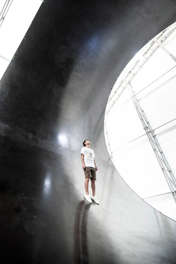 Japanese art curator Yusaku Maezawa, pictured inside a component of the BFR, says he has always been inspired by the Moon – and he's booked a ticket to see it up close