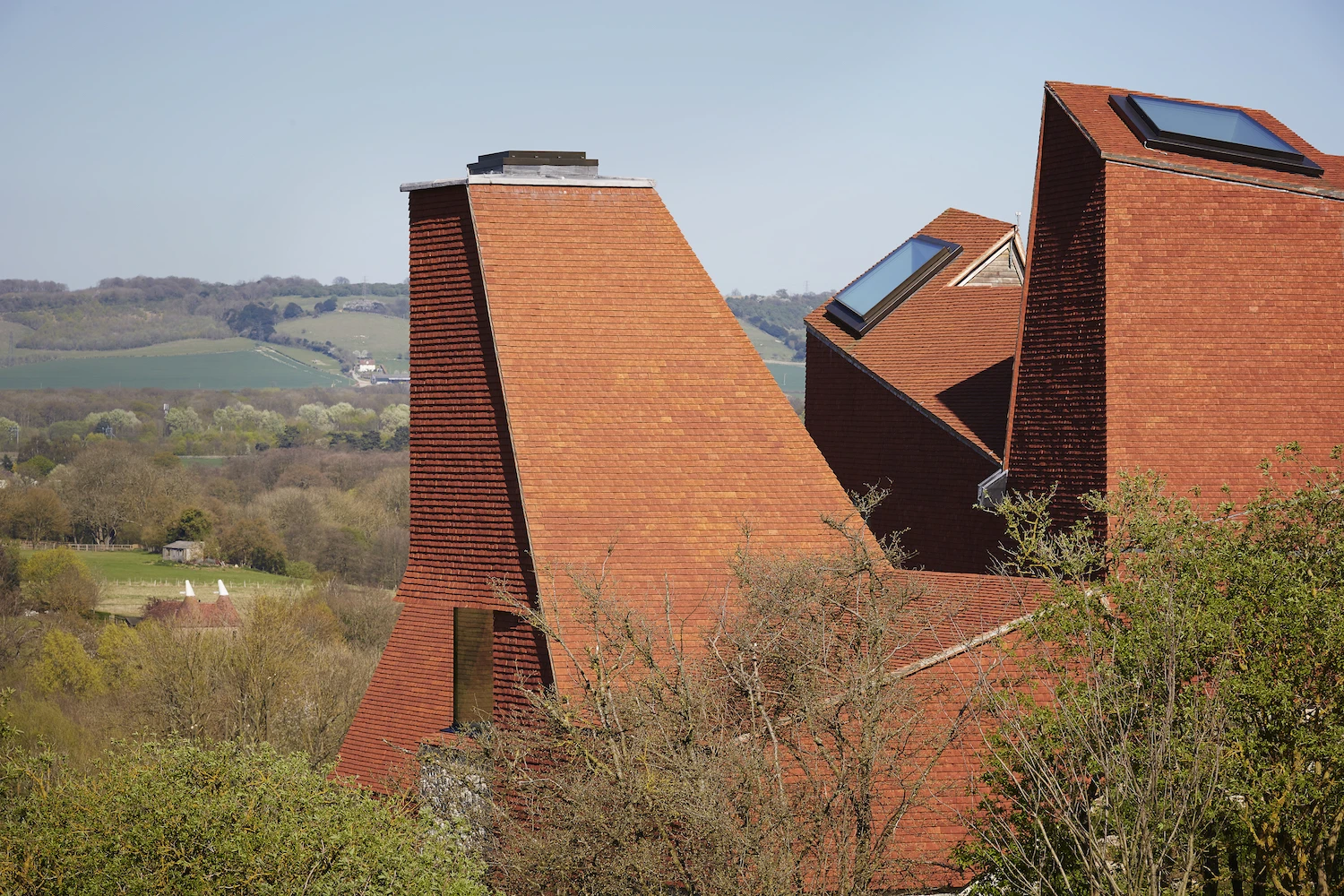 Caring Wood is a large luxury home situated within a rolling 84 acre (33 hectare) estate in the Kent countryside