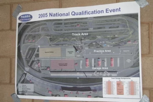 Normally the venue for a vastly different form of motorsport played out with a driver and very high speeds - garage allocation for the teams.