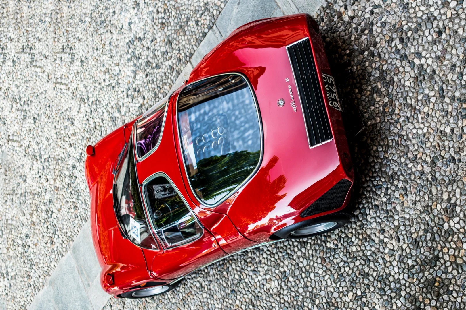 Voted "Best of Show" by the public at Villa d'Este, this Alfa Romeo 33/2 Stradale is one of just 18 Alfa Romeo 33/2 Stradale (roadgoing) cars produced, and just 13 were bodied in this Franco Scaglione aluminum creation