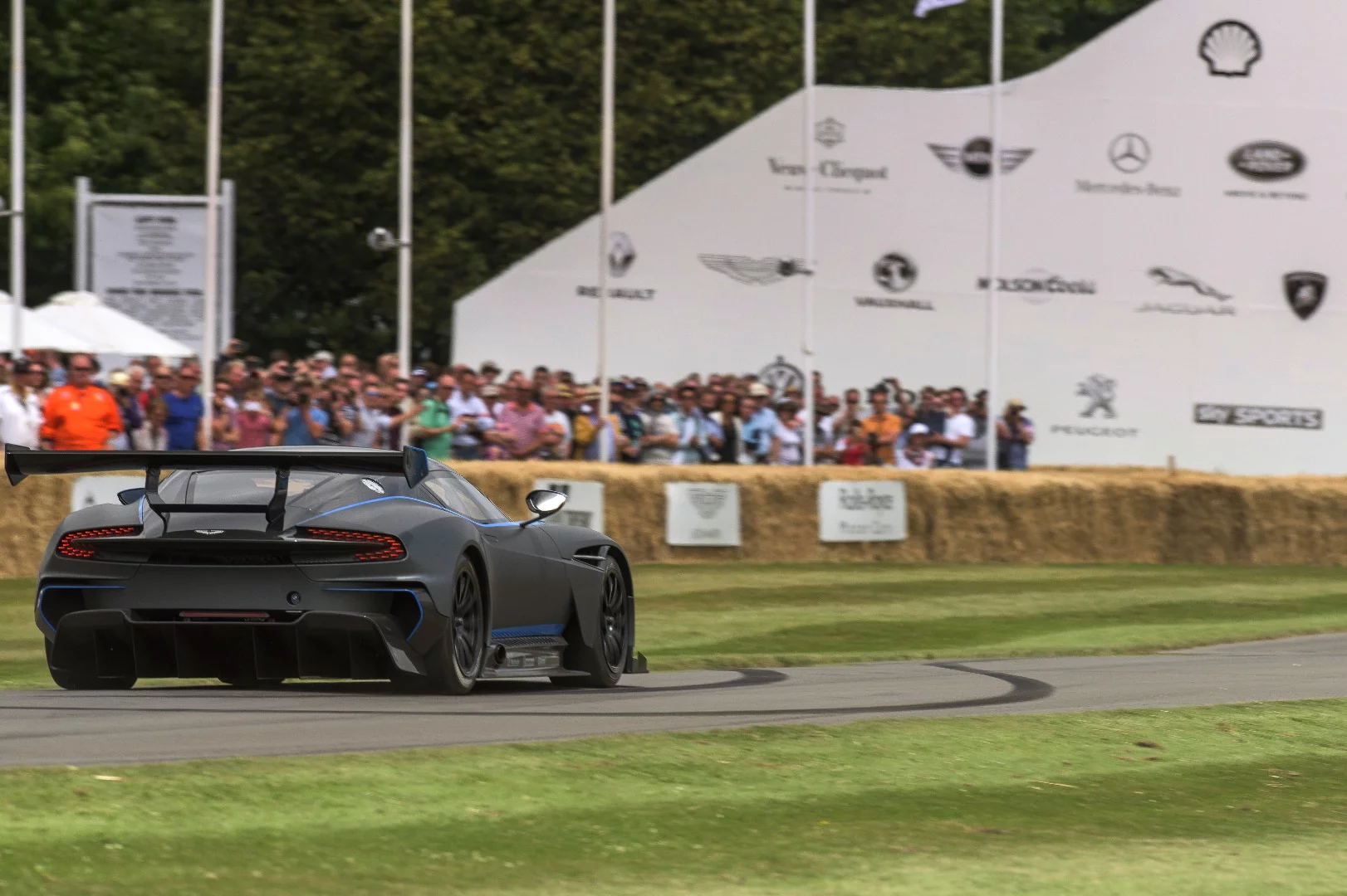 Aston Martin Racing works’ driver Darren Turner puts the Vulcan through it's paces at Goodwood.