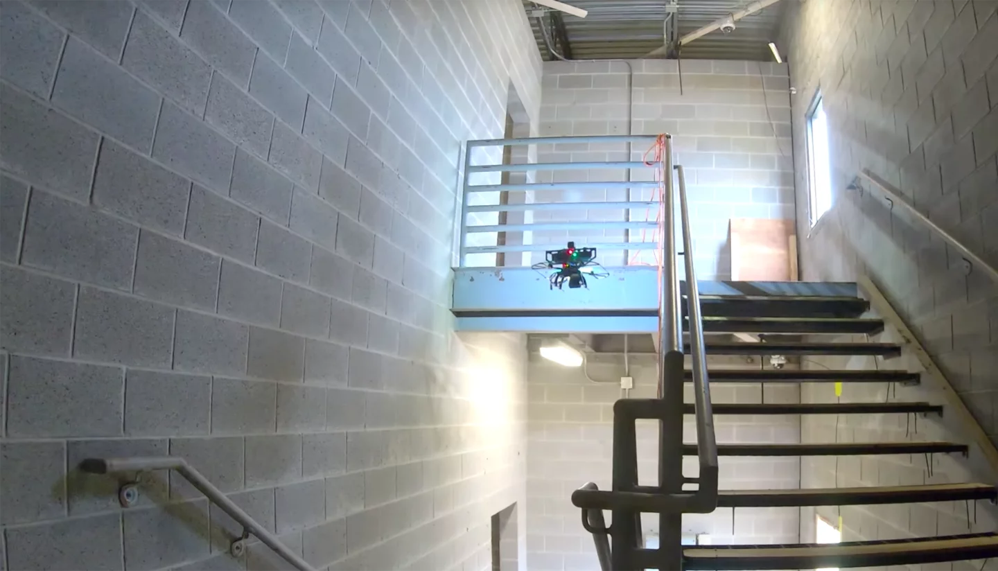 A DARPA FLA UAV autonomously negotiating a stairwell