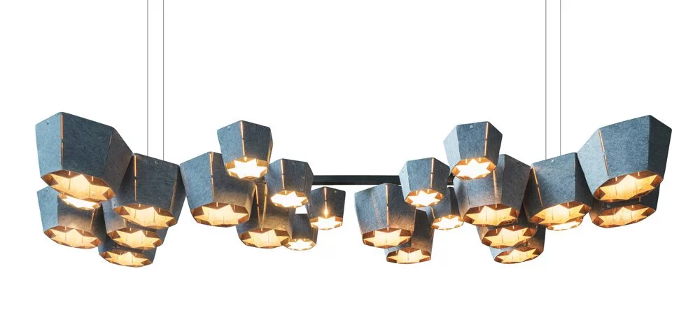 Barnacles found on the skin of a whale inform the shape of the Plastic Whale lamp