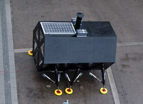 The solar panels and batteries on the roof