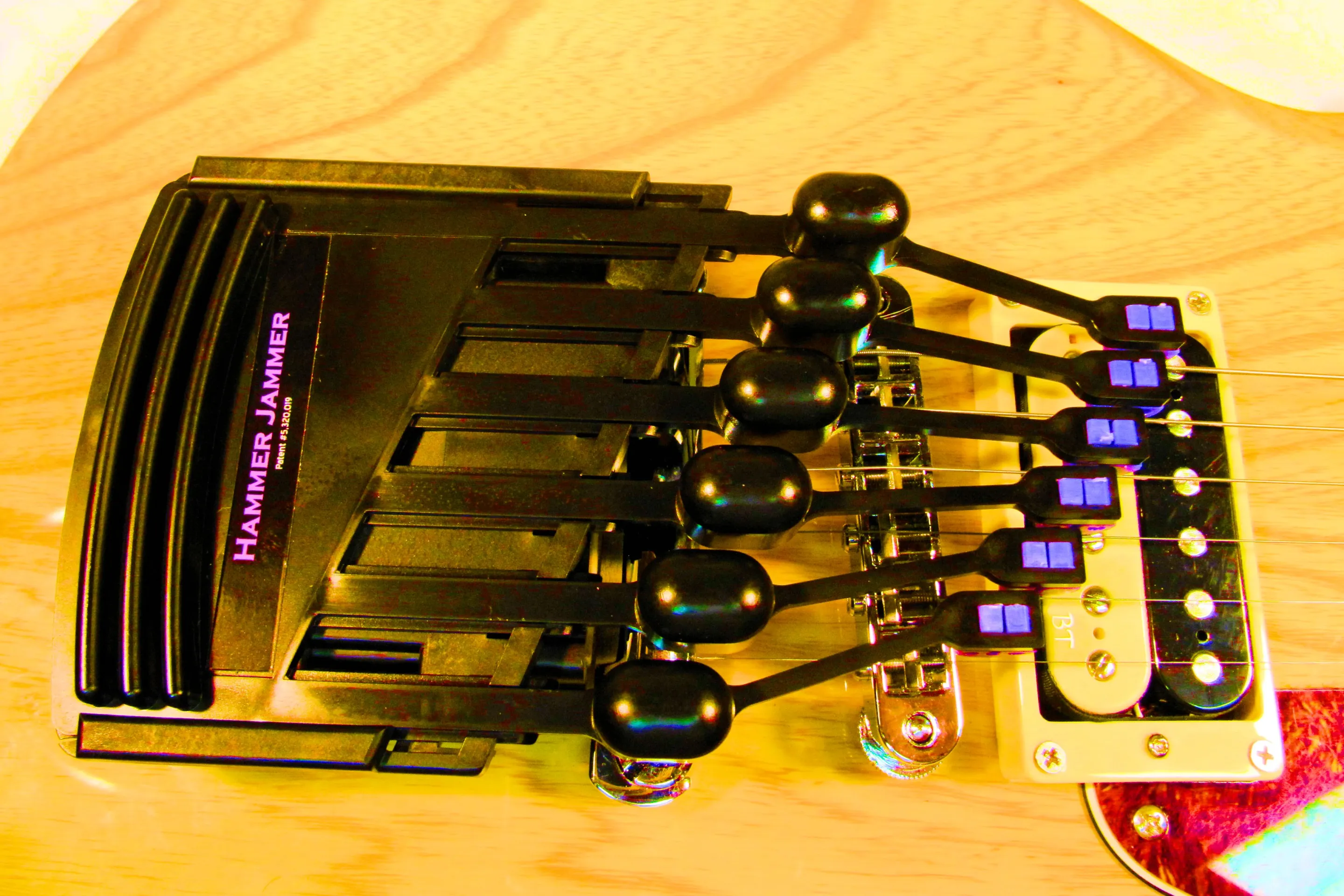 The Hammer Jammer installed on an electric guitar