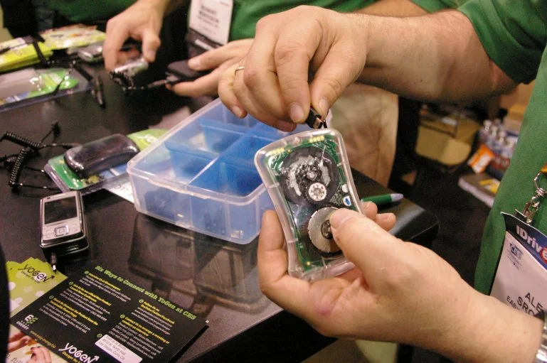 The YoGen charger shown here at CES 2010, uses your energy to power the batteries of most portable electronic devices