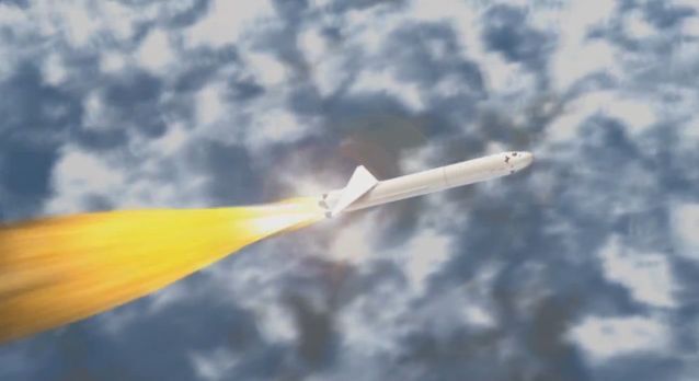 The booster rocket firing upon release from the aircraft