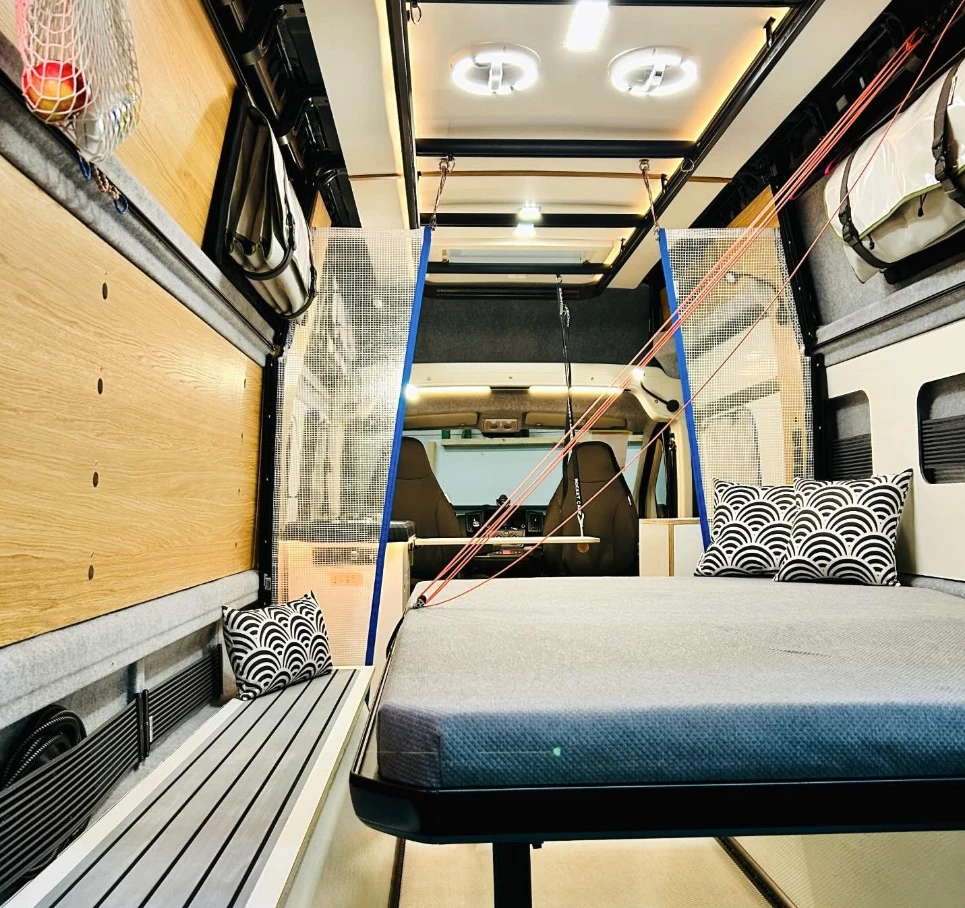 The Murphy double bed folds down at night and back against the wall during the day