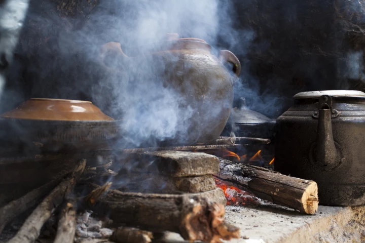 RTI's stove could be a cleaner, healthier alternative to smoky cooking fires like this one