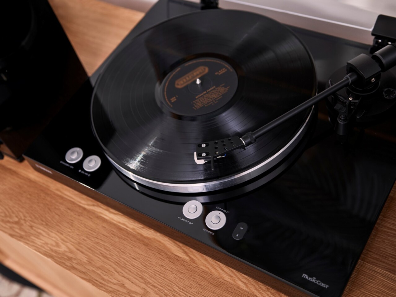 The belt-drive Vinyl 500 turntable comes with a Moving Magnet cartridge mounted to a balanced straight tonearm