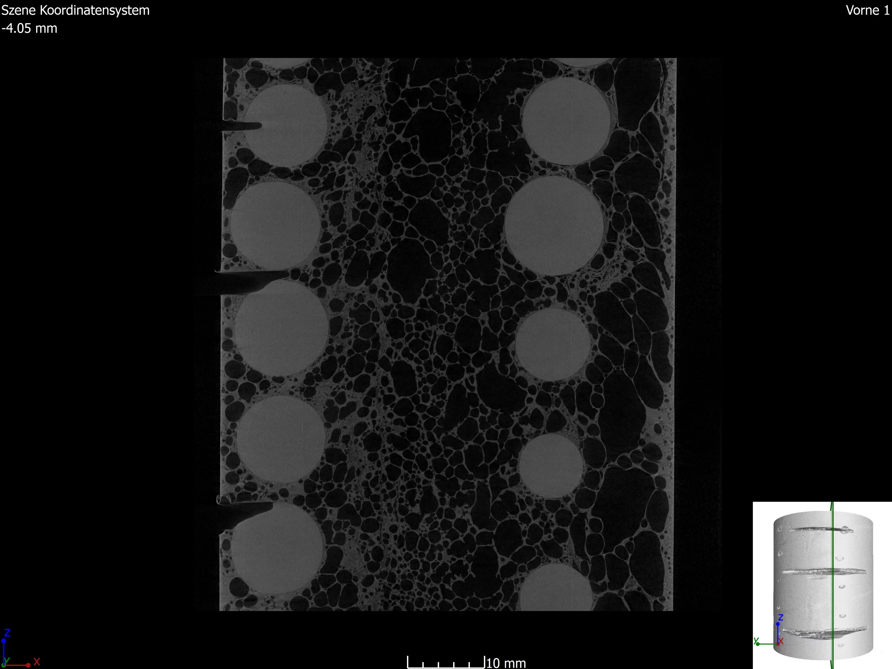 CT scan of the Proteus material showing the cellular aluminium structure wrapped around ceramic spheres. Attempted angle grinder cuts show up on the left