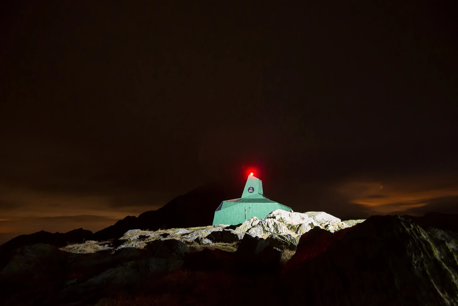 The shelter's solar panel powers a roof-based exterior light