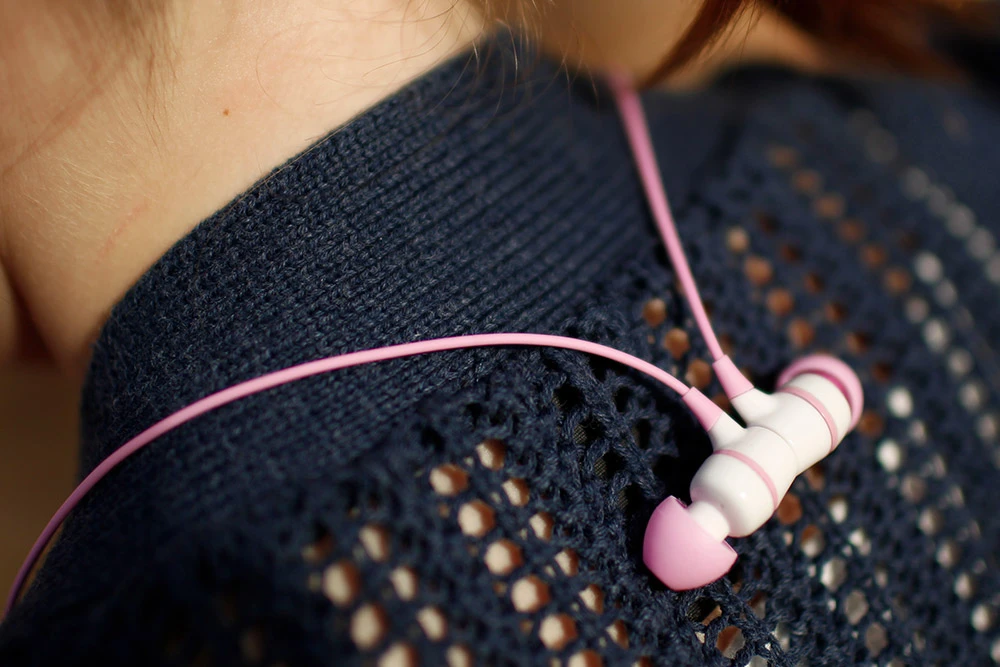 The two ear buds are designed to snap together, so they can be worn around the neck when not in use
