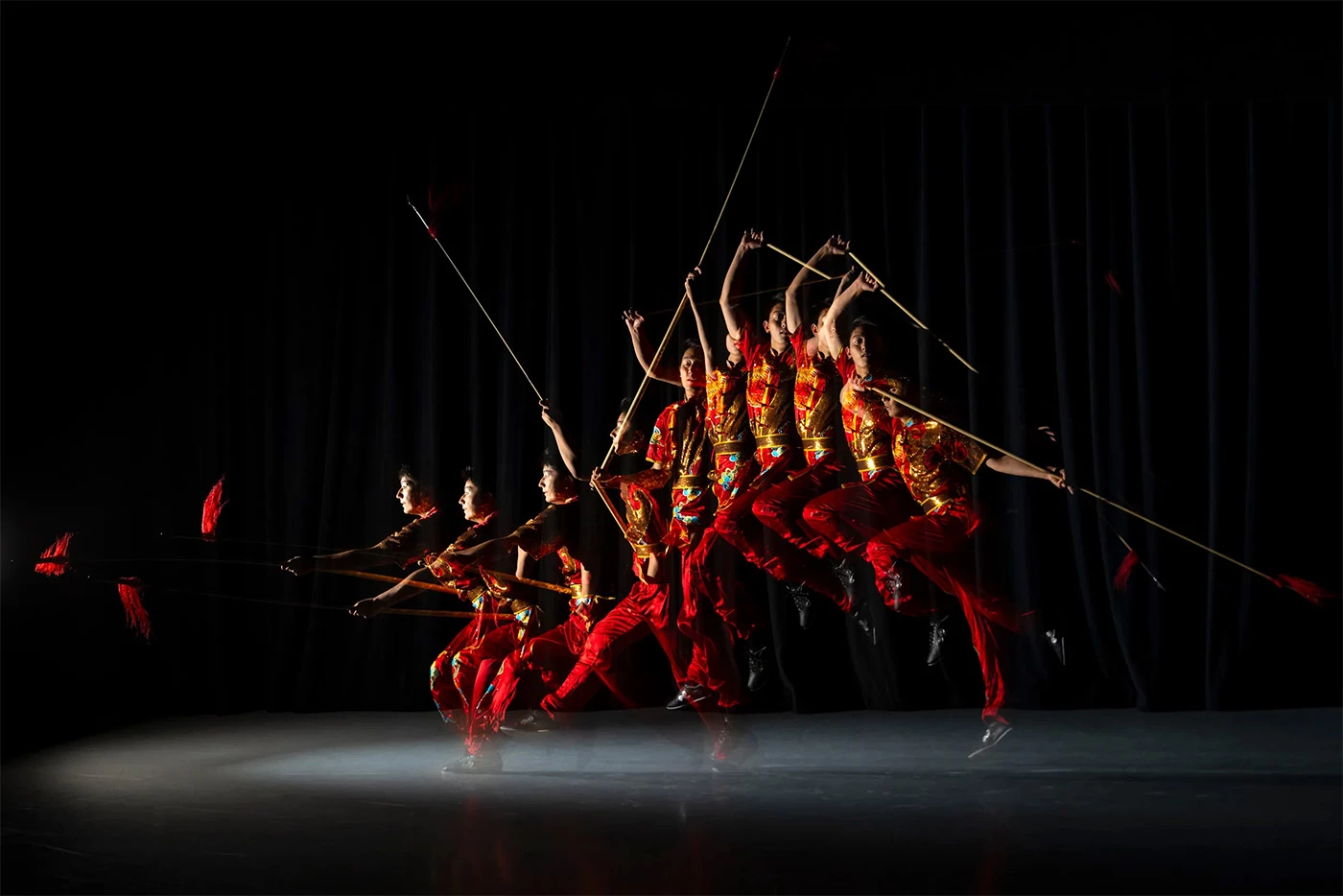 Alan Huang of the Harvard WuShu Club photographed using a spear, with a stroboscopic flash