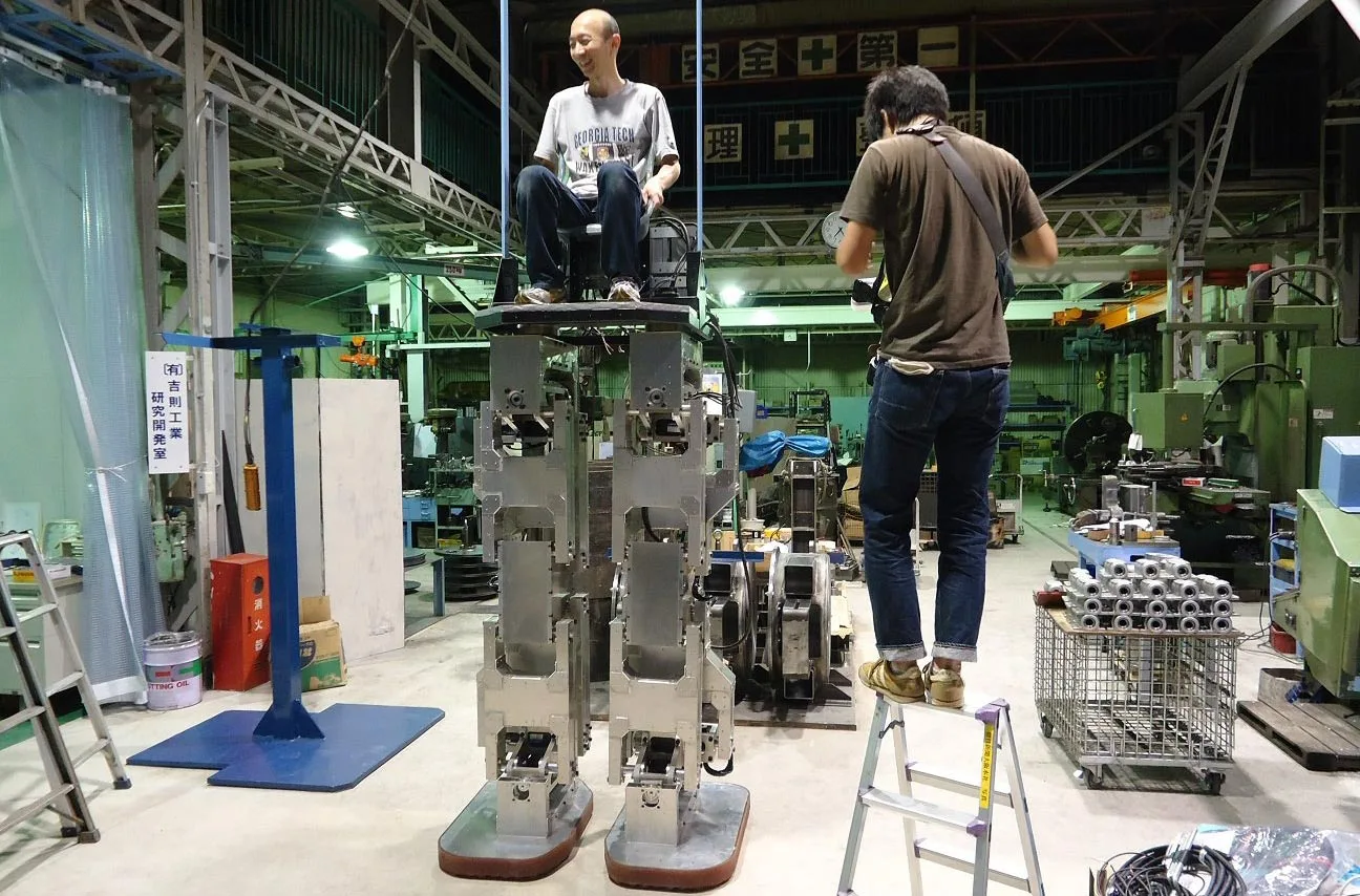 Hajime Sakamoto sits in the pilot seat of his 4 meter tall robot