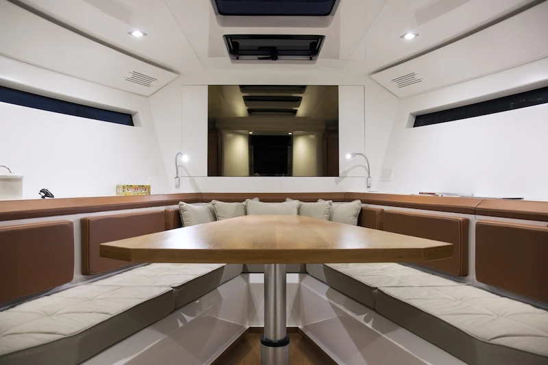 The table adjusts between bed and lounge heights