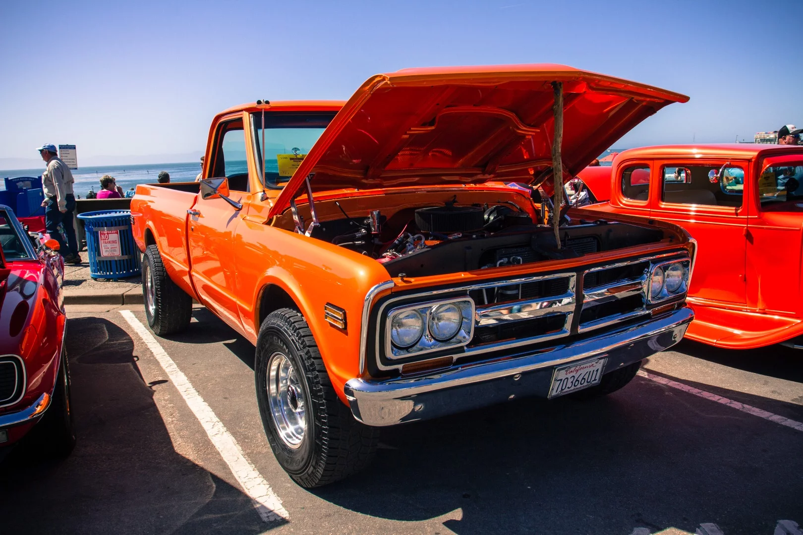 1968 GMC C20. In orange. With a stick holding the hood open. It doesn't get a lot cooler than that