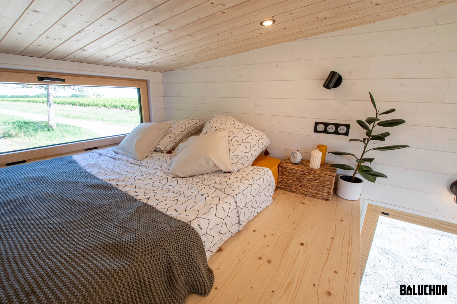The Nouvelle Dans' upstairs bedroom includes a double bed and has a low ceiling